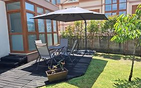 Apartamento con jardín